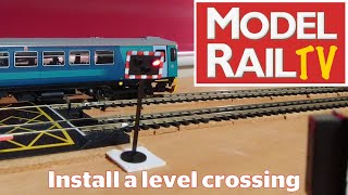 Model Rail How To Install a level crossing [upl. by Ahsenom]